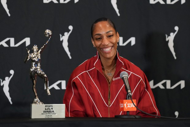Las Vegas Aces center A'ja Wilson speaks during a news conference on receiving the 2025 WNBA Most Valuable Player award before Game 1 in the semifinals of the WNBA basketball playoffs Sunday, Sept. 21, 2025, in Las Vegas. (AP Photo/Candice Ward)