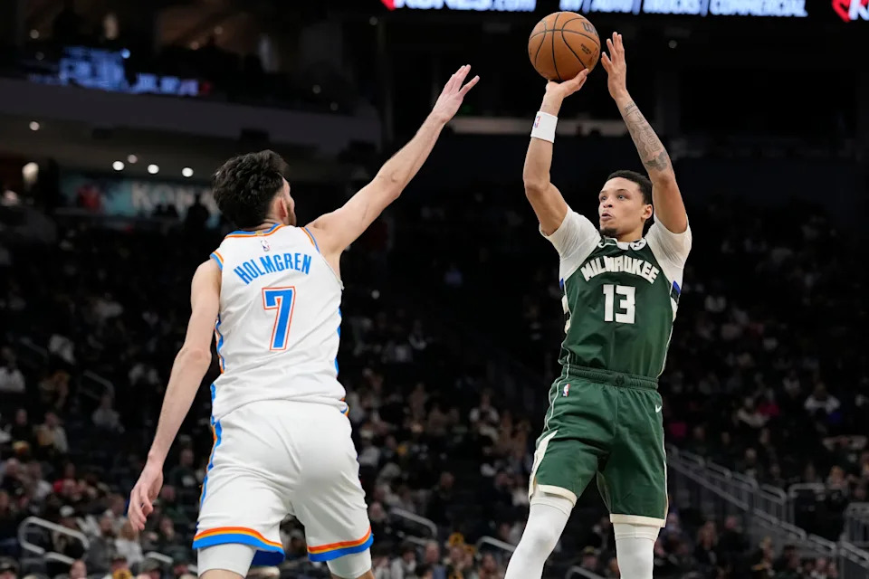 MILWAUKEE, WISCONSIN - JANUARY 21: Ryan Rollins #13 of the Milwaukee Bucks shoots the ball against Chet Holmgren #7 of the Oklahoma City Thunder during the third quarter at Fiserv Forum on January 21, 2026 in Milwaukee, Wisconsin. NOTE TO USER: User expressly acknowledges and agrees that, by downloading and or using this photograph, User is consenting to the terms and conditions of the Getty Images License Agreement. (Photo by Patrick McDermott/Getty Images)