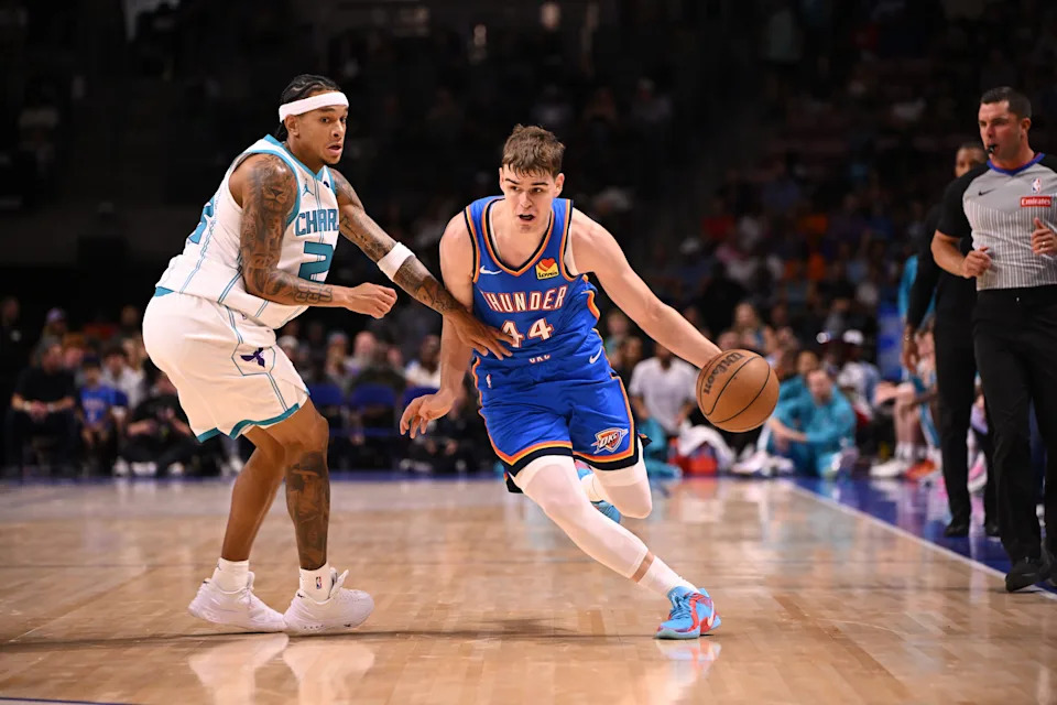Oct 5, 2025; North Charleston, South Carolina, USA; Oklahoma City Thunder guard Nikola Topic (44) drives up the court against the Charlotte Hornets in the first quarter at North Charleston Coliseum. Mandatory Credit: Arthur Ellis-Imagn Images