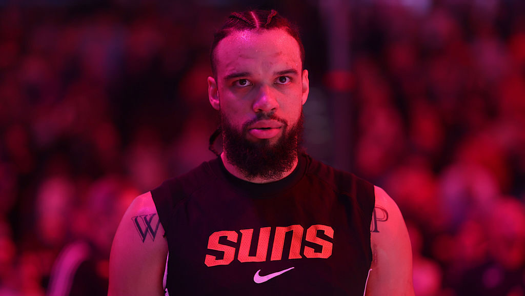 Dillon Brooks #3 of the Phoenix Suns looks on during the national anthem before the game against th...