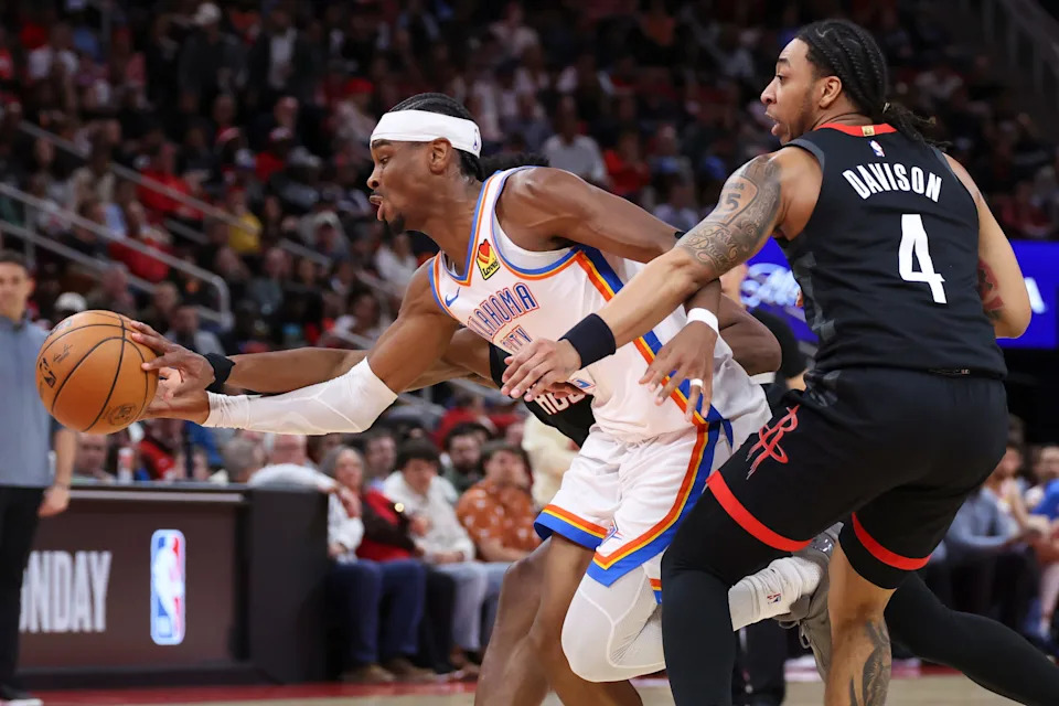 Jan 15, 2026; Houston, Texas, USA; Oklahoma City Thunder guard Shai Gilgeous-Alexander (2) attempts to keep control of the ball during the third quarter against the Houston Rockets at Toyota Center. Mandatory Credit: Troy Taormina-Imagn Images