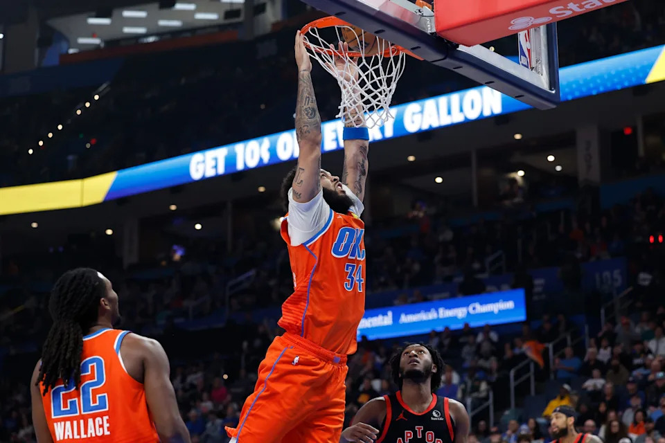 Jan 25, 2026; Oklahoma City, Oklahoma, USA; Oklahoma City Thunder guard/forward Kenrich Williams (34) dunks against the Toronto Raptors during the second quarter at Paycom Center. Mandatory Credit: Alonzo Adams-Imagn Images