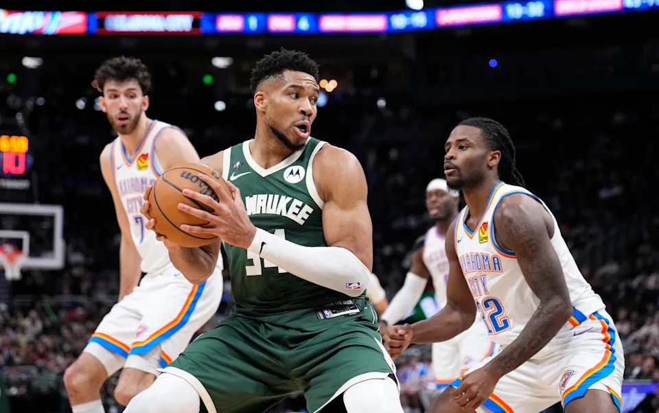 Jan 21, 2026; Milwaukee, Wisconsin, USA; Milwaukee Bucks forward Giannis Antetokounmpo (34) drives to the basket against Oklahoma City Thunder guard Cason Wallace (22) in the second half at Fiserv Forum. Mandatory Credit: Michael McLoone-Imagn Images