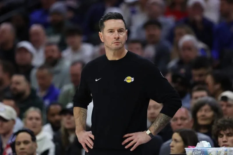 Dec 7, 2025; Philadelphia, Pennsylvania, USA; Los Angeles Lakers head coach JJ Redick looks on during the second quarter against the Philadelphia 76ers at Xfinity Mobile Arena. Mandatory Credit: Bill Streicher-Imagn Images