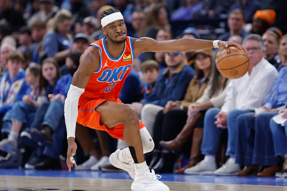 Jan 25, 2026; Oklahoma City, Oklahoma, USA; Oklahoma City Thunder guard Shai Gilgeous-Alexander (2) reaches for a loose ball during the second half against the Toronto Raptors at Paycom Center. Mandatory Credit: Alonzo Adams-Imagn Images