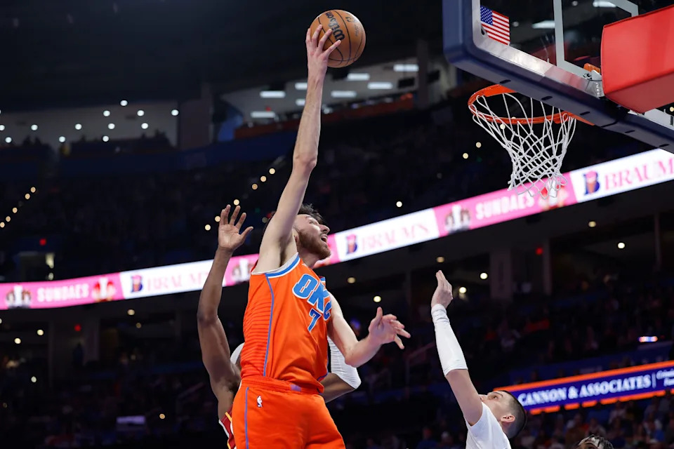 Jan 11, 2026; Oklahoma City, Oklahoma, USA; Oklahoma City Thunder center/forward Chet Holmgren (7) goes up for a basket against the Miami Heat during the second half at Paycom Center. Mandatory Credit: Alonzo Adams-Imagn Images