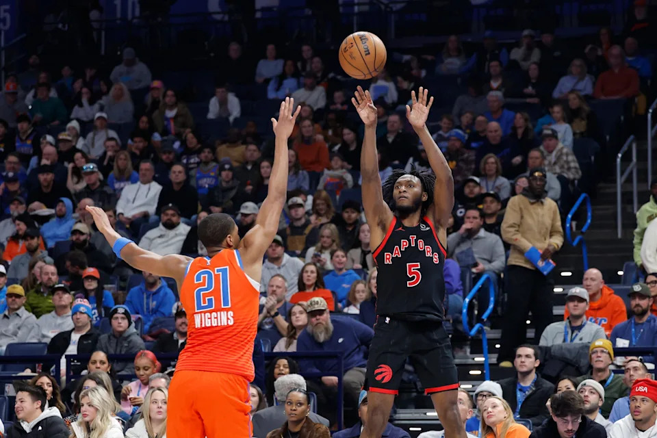 Jan 25, 2026; Oklahoma City, Oklahoma, USA; Toronto Raptors guard Immanuel Quickley (5) shoots over Oklahoma City Thunder guard Aaron Wiggins (21) during the second half at Paycom Center. Mandatory Credit: Alonzo Adams-Imagn Images