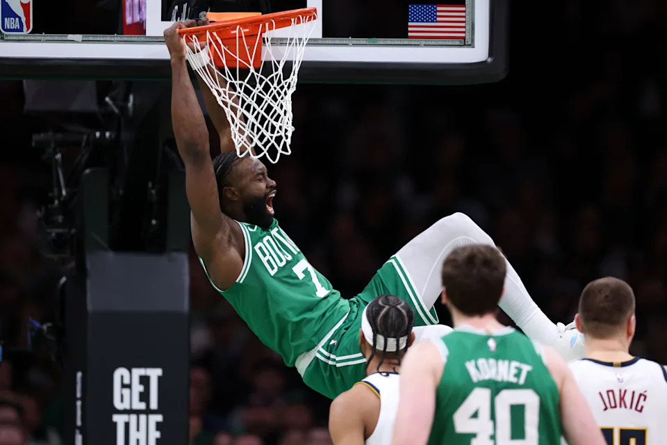 Mar 2, 2025; Boston, Massachusetts, USA; Boston Celtics forward Jaylen Brown (7) dunks the ball during the first half against the Denver Nuggets at TD Garden. Mandatory Credit: Paul Rutherford-Imagn Images