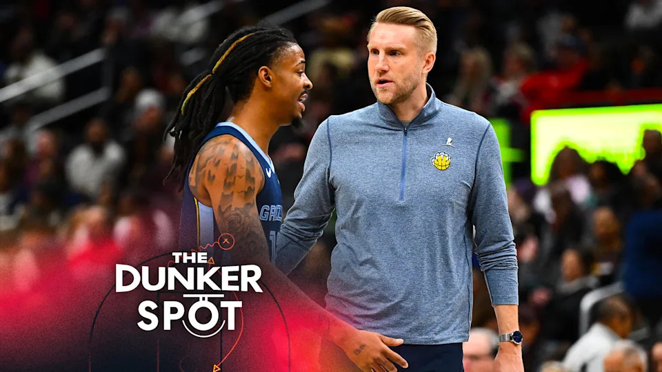 Dec 28, 2025; Washington, District of Columbia, USA; Memphis Grizzlies head coach Tuomas Iisalo talks with guard Ja Morant (12) against the Washington Wizards during the first half at Capital One Arena. Credit: Brad Mills-Imagn Images