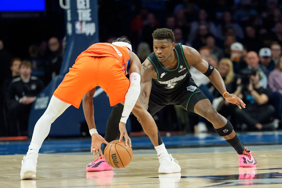 Jan 29, 2026; Minneapolis, Minnesota, USA; Minnesota Timberwolves guard Anthony Edwards (5) defends Oklahoma City Thunder guard Shai Gilgeous-Alexander (2) in the first quarter at Target Center. Mandatory Credit: Matt Blewett-Imagn Images