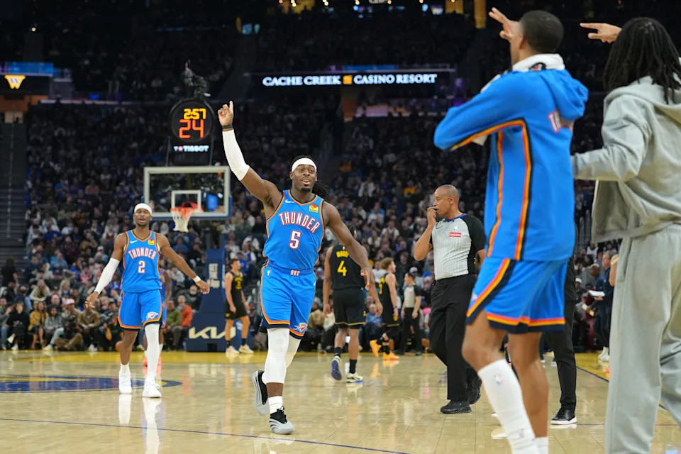Jan 2, 2026; San Francisco, California, USA; Oklahoma City Thunder guard Luguentz Dort (5) gestures after making a three point basket against the Golden State Warriors during the second quarter at Chase Center. Mandatory Credit: Darren Yamashita-Imagn Images