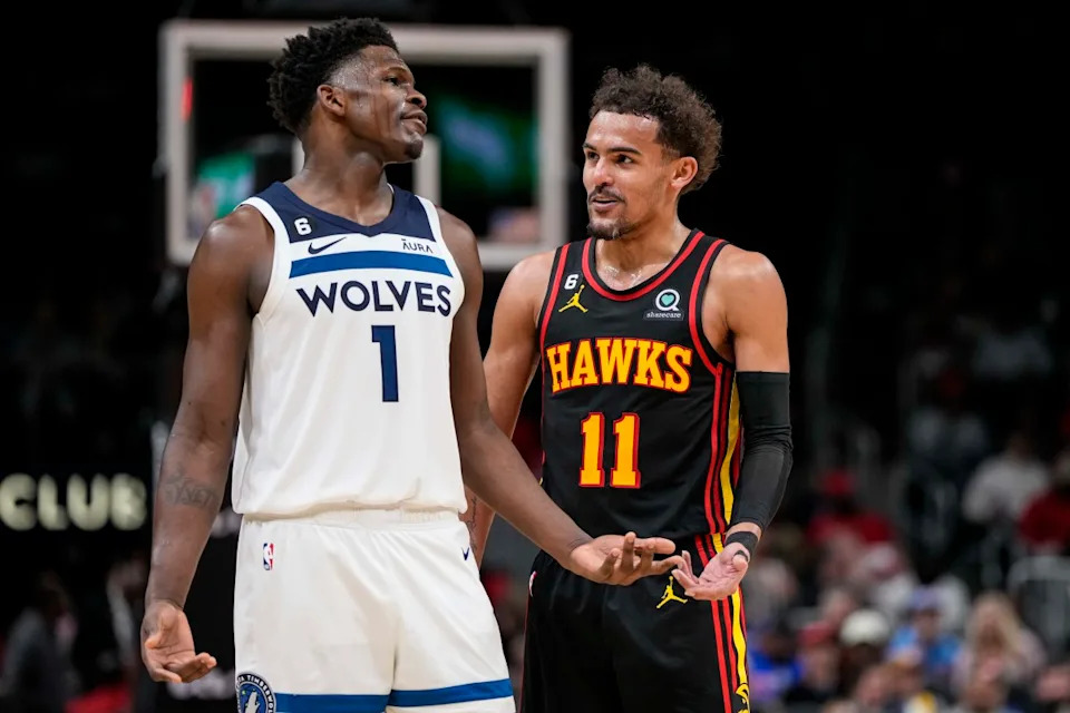Minnesota Timberwolves guard Anthony Edwards (1) reacts with Atlanta Hawks guard Trae Young (11)Dale Zanine-USA TODAY Sports