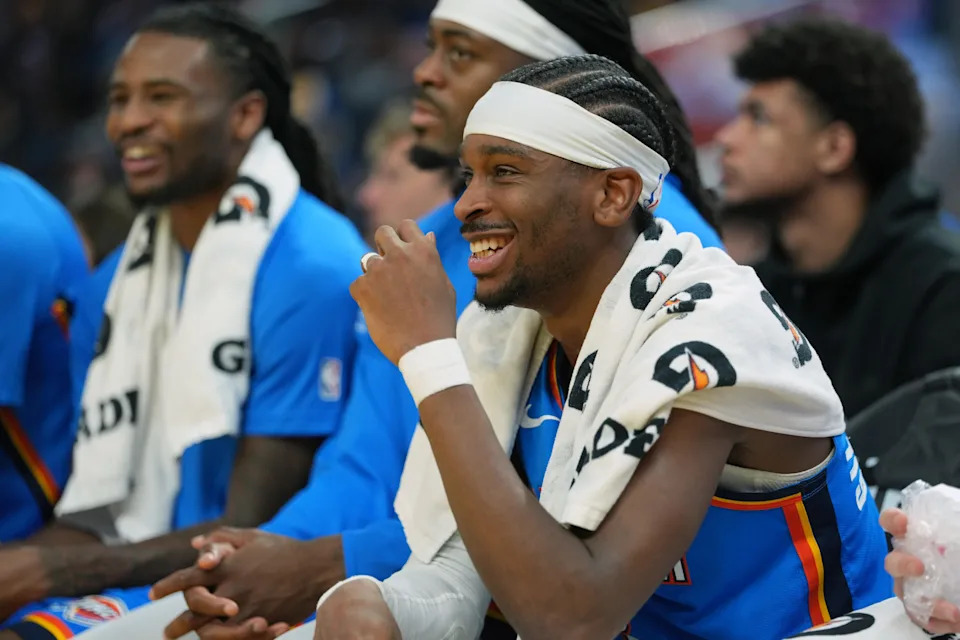 Jan 2, 2026; San Francisco, California, USA; Oklahoma City Thunder guard Shai Gilgeous-Alexander (center) sits on the bench during the second quarter against the Golden State Warriors at Chase Center. Mandatory Credit: Darren Yamashita-Imagn Images