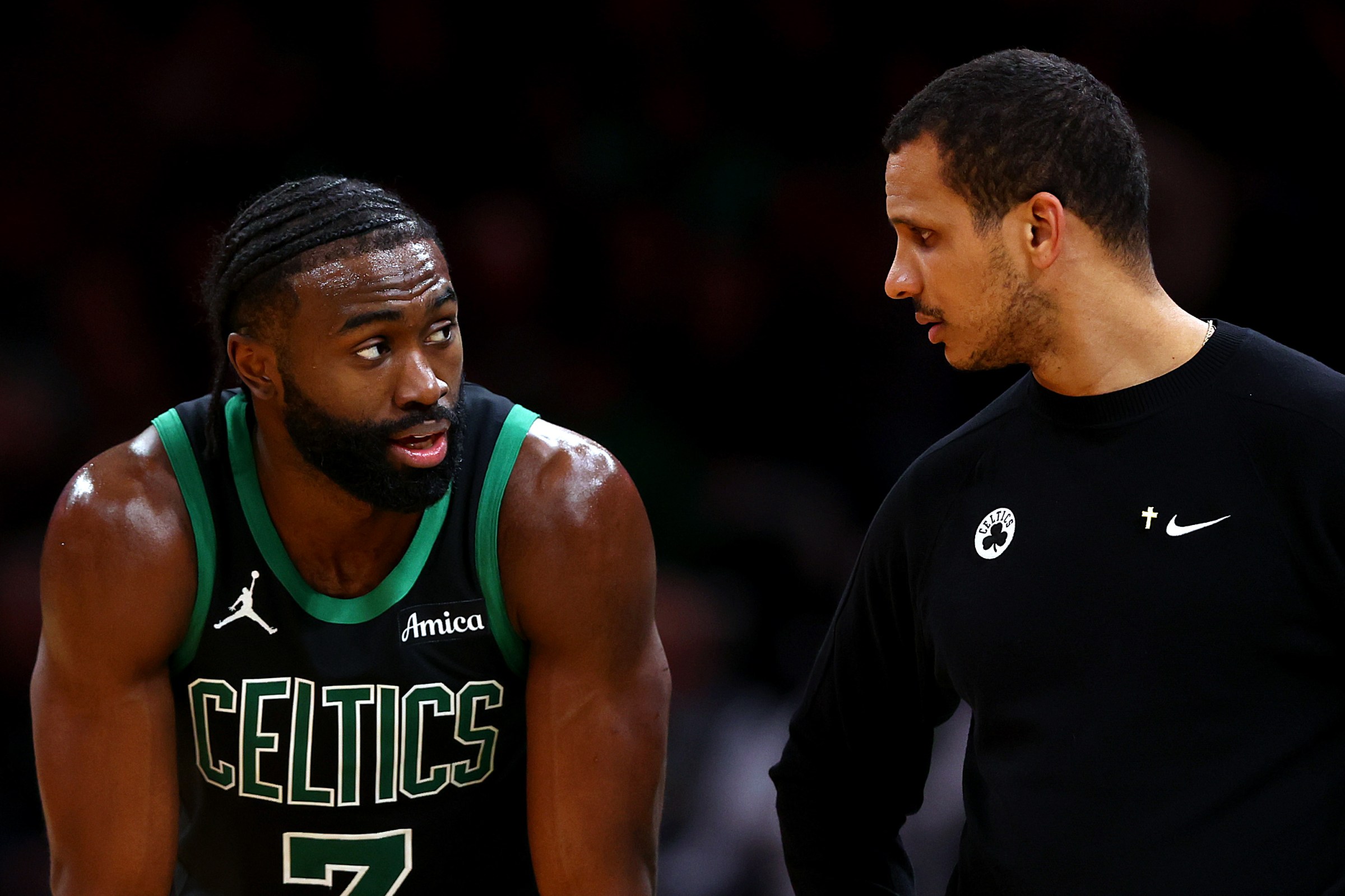 BOSTON, MASSACHUSETTS - DECEMBER 27: Jaylen Brown #7 of the Boston Celtics talks with Head Coach Joe Mazzulla during the second half against the Indiana Pacers at TD Garden on December 27, 2024 in Boston, Massachusetts. The Celtics defeat the Pacers 142-105. (Photo by Maddie Meyer/Getty Images)