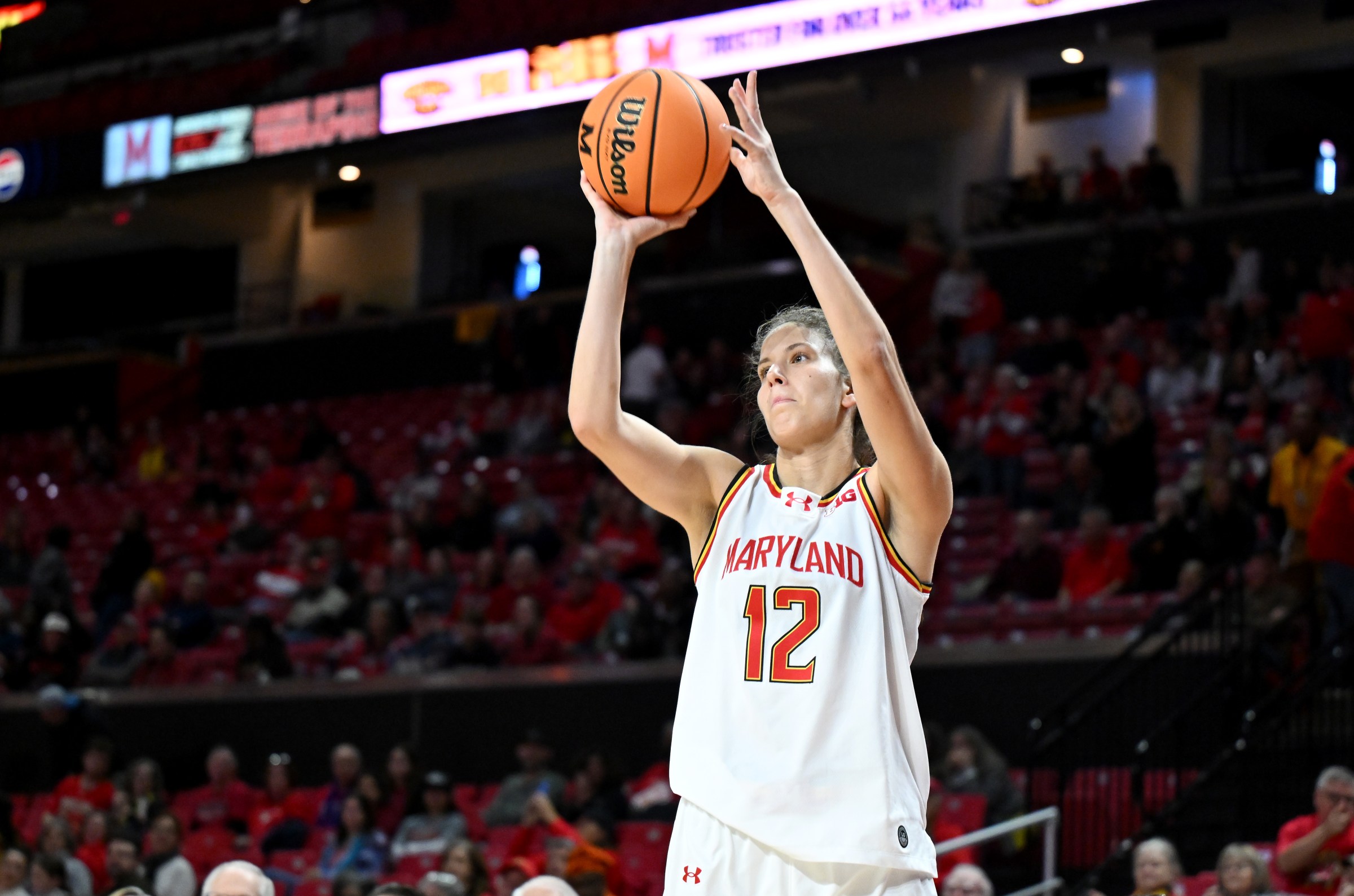 COLLEGE PARK, MARYLAND - NOVEMBER 16: Yarden Garzon #12 of the Maryland Terrapins shoots the ball in the fourth quarter against the Princeton Tigers at Xfinity Center on November 16, 2025 in College Park, Maryland. (Photo by G Fiume/Getty Images)