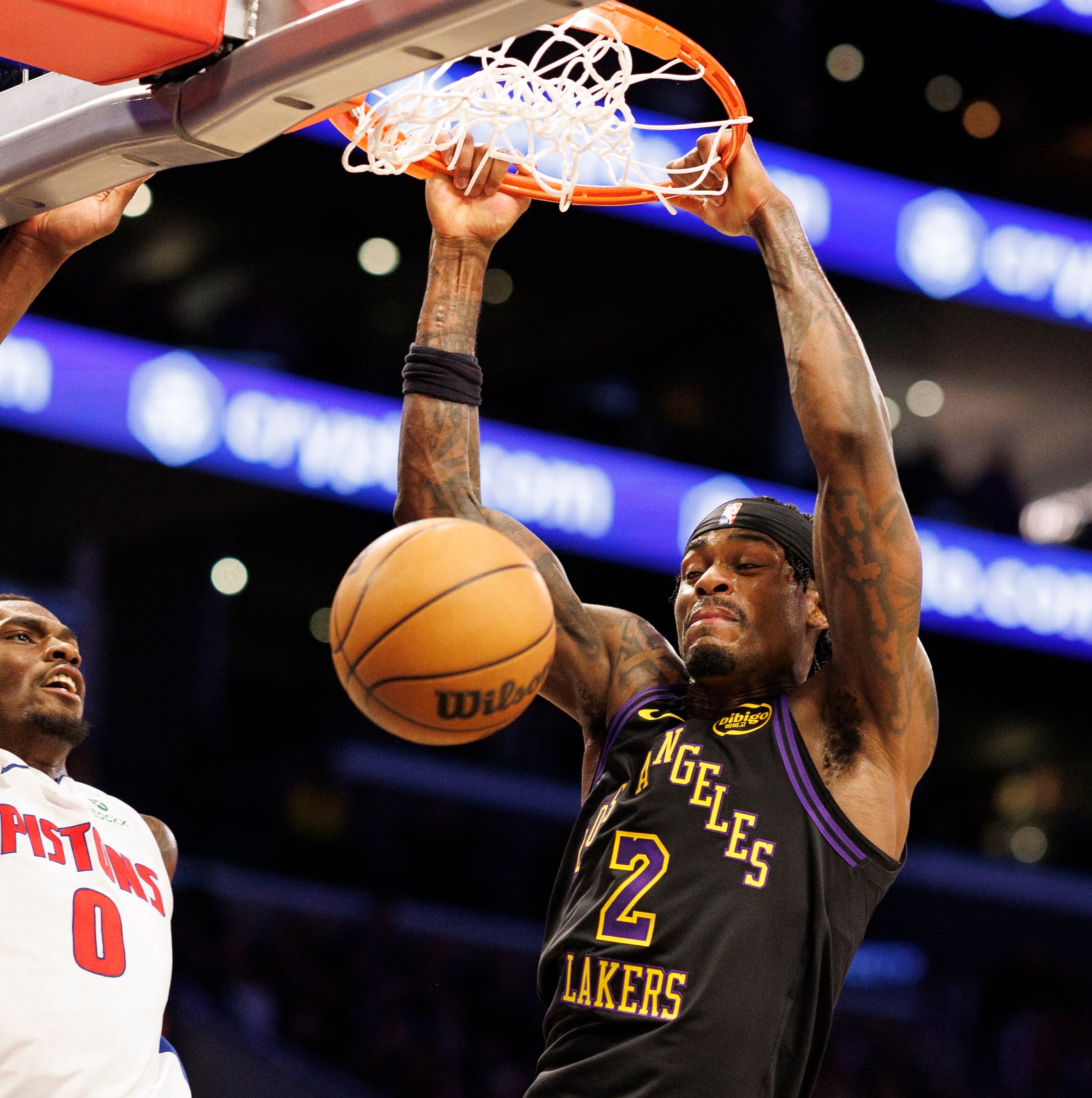 LOS ANGELES, CA - DECEMBER 30, 2025: Los Angeles Lakers forward Jarred Vanderbilt (2) scores on a dunk shot against Detroit Pistons center Jalen Duren (0) in the first half at Crypto.com Arena on December 30, 2025 in Los Angeles, California.(Gina Ferazzi / Los Angeles Times via Getty Images)