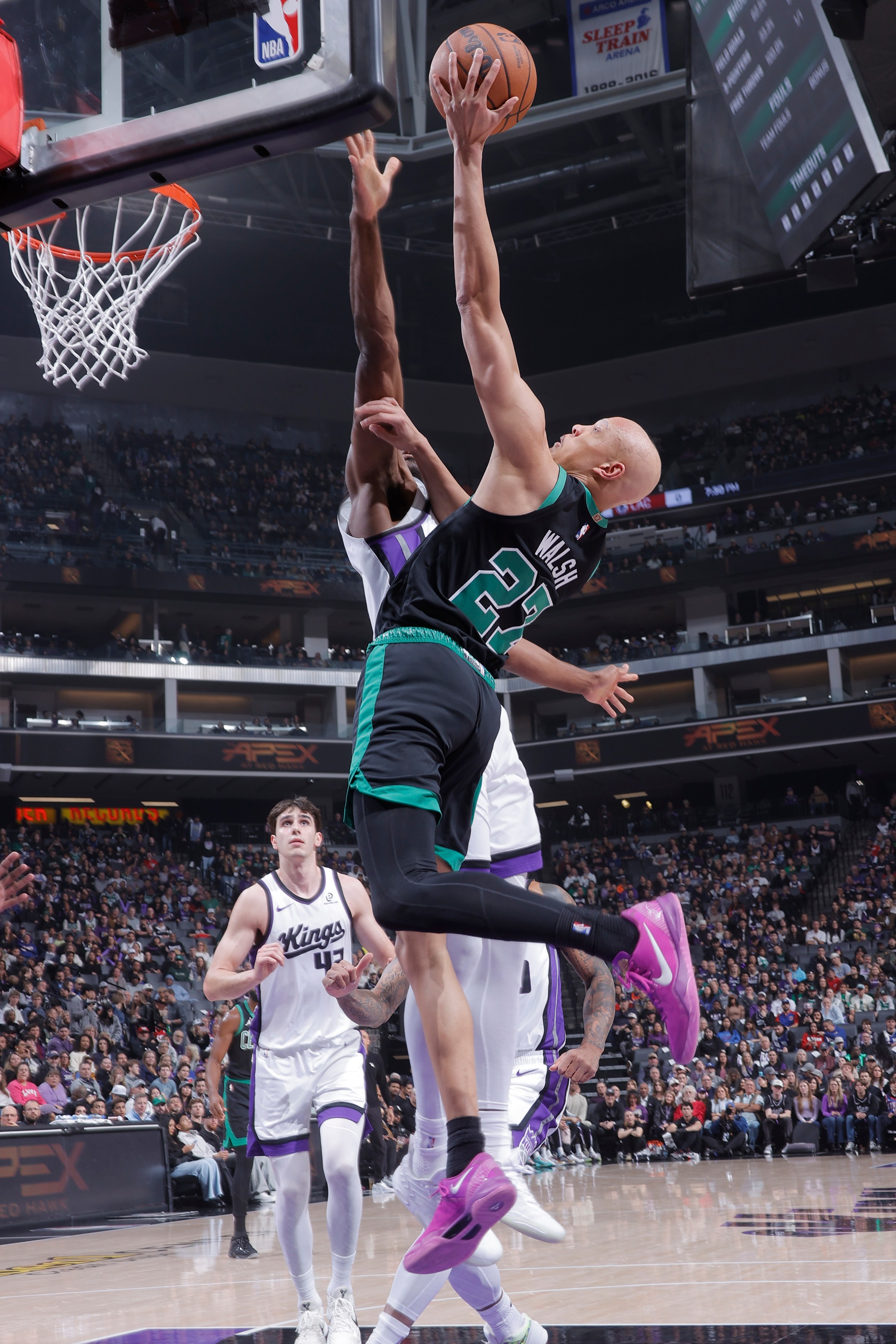 SACRAMENTO, CA - JANUARY 1: Jordan Walsh #27 of the Boston Celtics drives to the basket during the game against the Sacramento Kings on January 1, 2026 at Golden 1 Center in Sacramento, California. NOTE TO USER: User expressly acknowledges and agrees that, by downloading and or using this Photograph, user is consenting to the terms and conditions of the Getty Images License Agreement. Mandatory Copyright Notice: Copyright 2026 NBAE (Photo by Rocky Widner/NBAE via Getty Images)