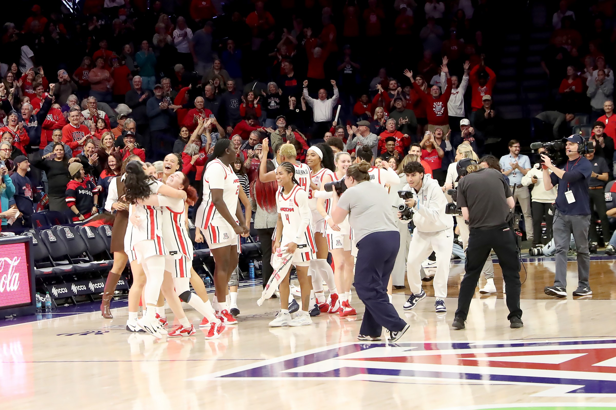 TUCSON, AZ - JANUARY 06: Arizona Wildcats players celebrate after defeating the BYU Cougars 75-72 on January 6, 2026, at McKale Center in Tucson, AZ. (Photo by Christopher Hook/Icon Sportswire via Getty Images)