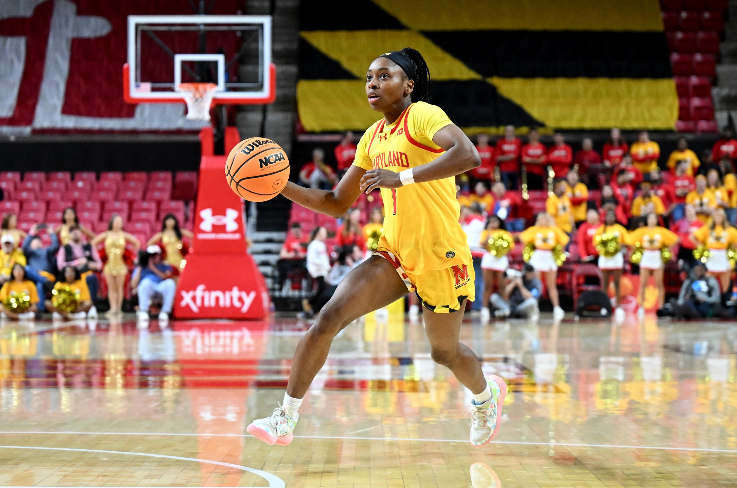 COLLEGE PARK, MARYLAND - DECEMBER 29: Oluchi Okananwa #7 of the Maryland Terrapins handles the ball against the Wisconsin Badgers at Xfinity Center on December 29, 2025 in College Park, Maryland. (Photo by G Fiume/Getty Images)