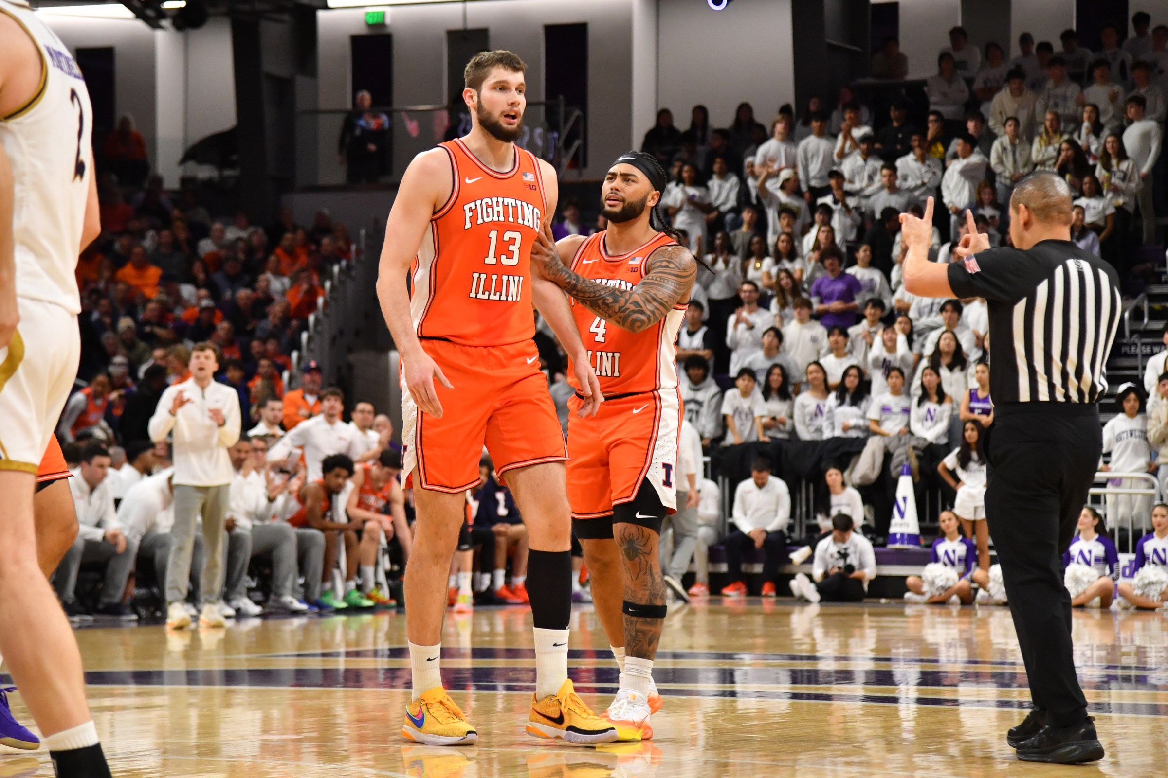 EVANSTON, IL - JANUARY 14: Illinois Fighting Illini center Tomislav Ivisic (13) reacts with Illinois Fighting Illini guard Kylan Boswell (4) during a college basketball game between the Illinois Fighting Illini and the Northwestern Wildcats on January 14, 2026, at Welsh-Ryan Arena in Evanston, IL. (Photo by Patrick Gorski/Icon Sportswire via Getty Images)