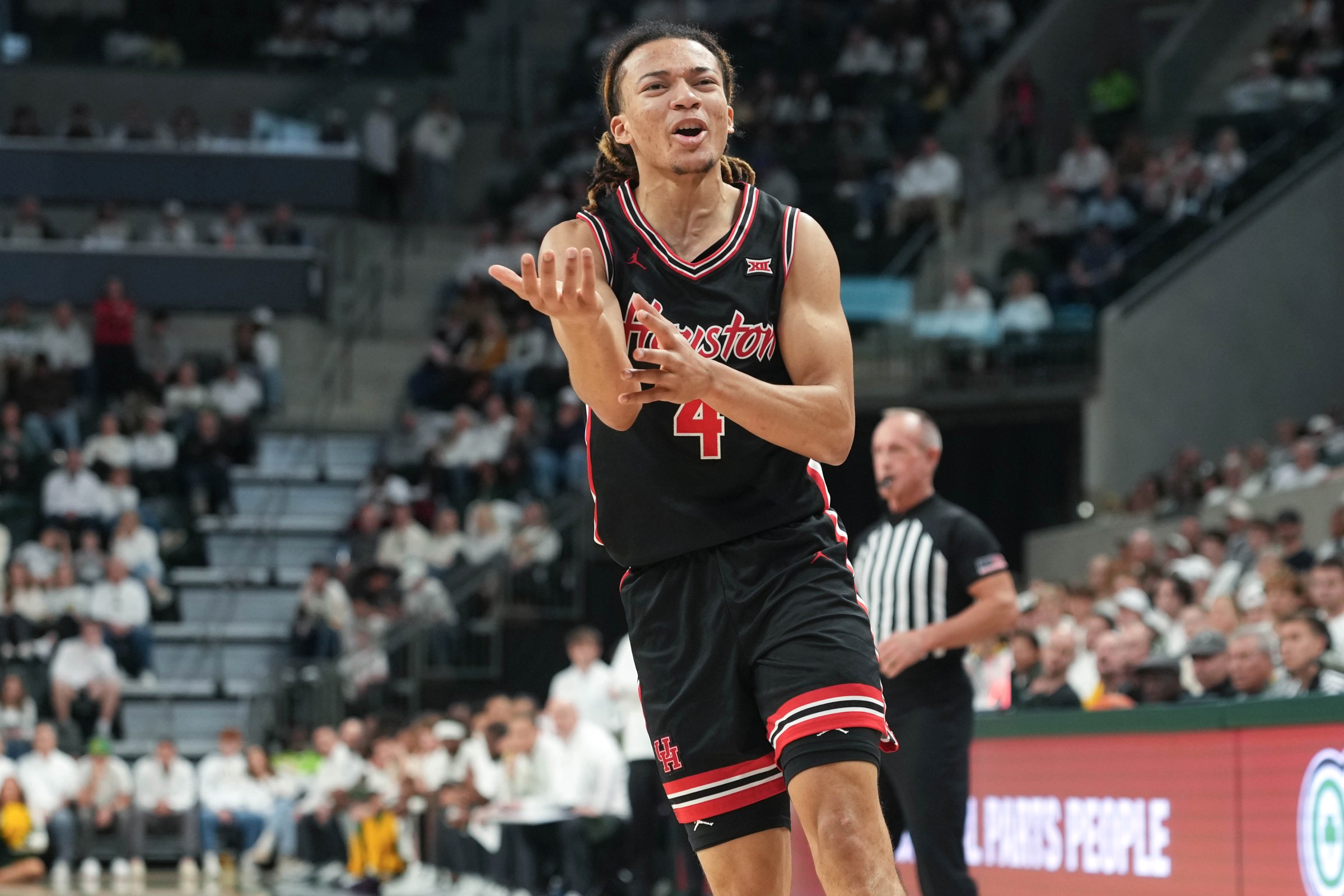 WACO, TEXAS - JANUARY 10: Kingston Flemings #4 of the Houston Cougars wants a foul called during the second half against the Baylor Bears at Foster Pavilion on January 10, 2026 in Waco, Texas. (Photo by Scott Wachter/Getty Images)