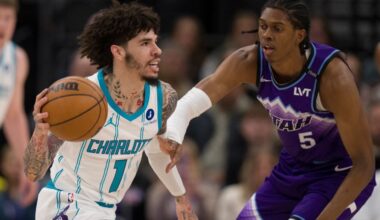 Charlotte Hornets guard LaMelo Ball (1) looks to pass the ball as Utah Jazz forward Cody Williams (5) defends during the first half of an NBA basketball game, Saturday, Jan. 10, 2026, in Salt Lake City. (AP Photo/Bethany Baker)