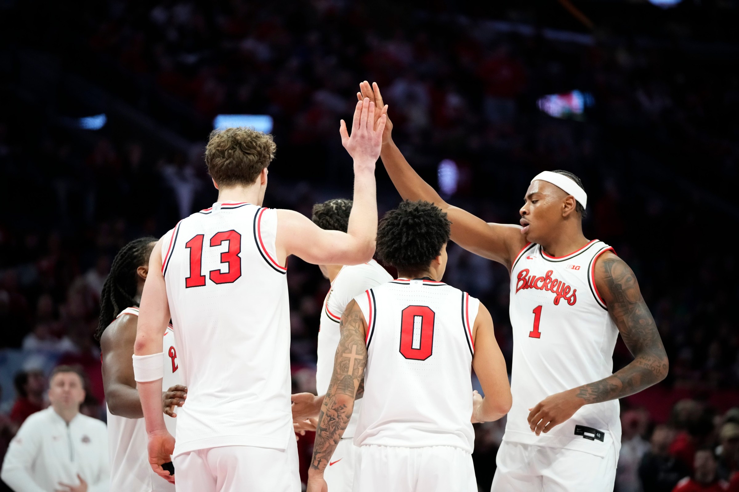 Ohio State Buckeyes forward Amare Bynum (1) high fives center Christoph Tilly (13) during the men’s NCAA basketball game at Value City Arena in Columbus on Nov. 16, 2025. Ohio State won 64-63.