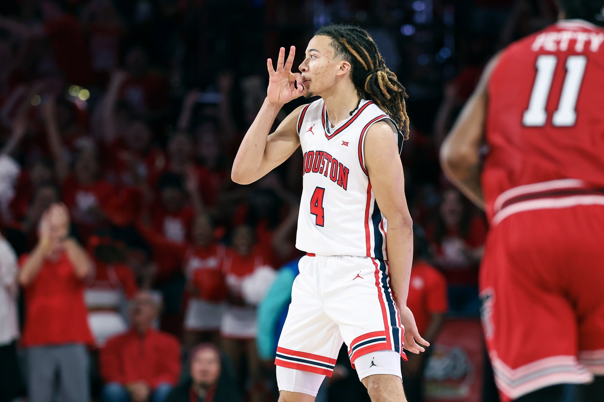 Kingston Flemings reacts after making a three against the Texas Tech Red Raiders. Mandatory Credit: Troy Taormina-Imagn Images