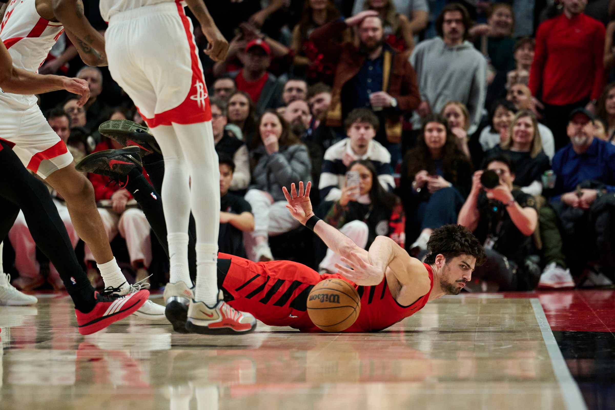 Jan 9, 2026; Portland, Oregon, USA; Portland Trail Blazers forward Deni Avdija (8) saves a loose ball during the second half against Houston Rockets forward Kevin Durant (7) at Moda Center. Mandatory Credit: Troy Wayrynen-Imagn Images