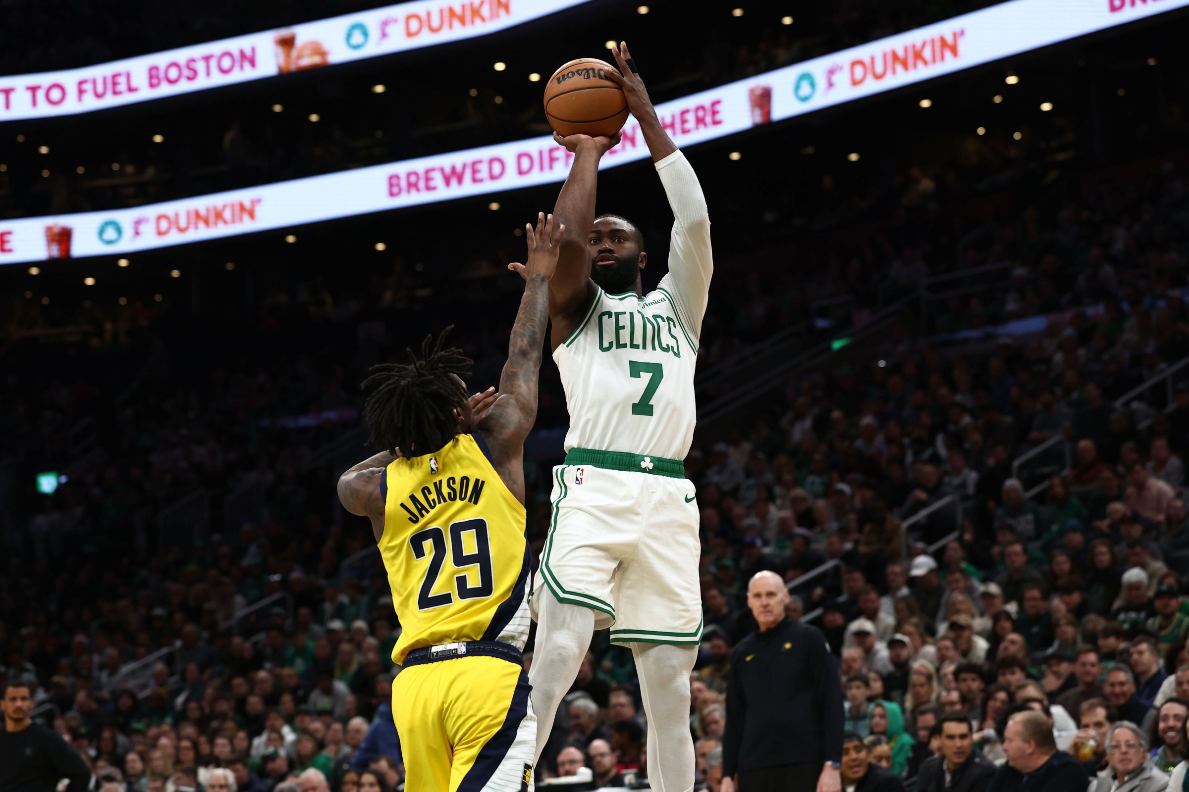 Jan 21, 2026; Boston, Massachusetts, USA; Boston Celtics guard Jaylen Brown (7) shoots over Indiana Pacers guard Quenton Jackson (29) during the second quarter at TD Garden. Mandatory Credit: Winslow Townson-Imagn Images