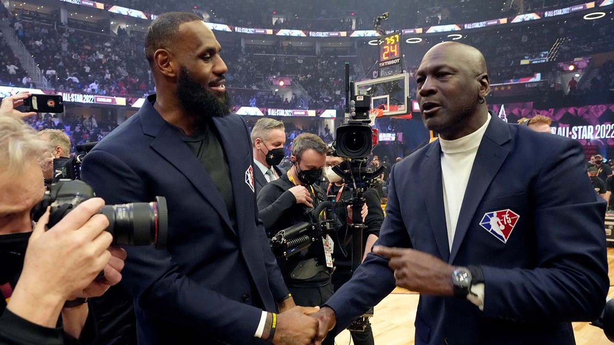 LeBron James and Michael Jordan attend an NBA event
