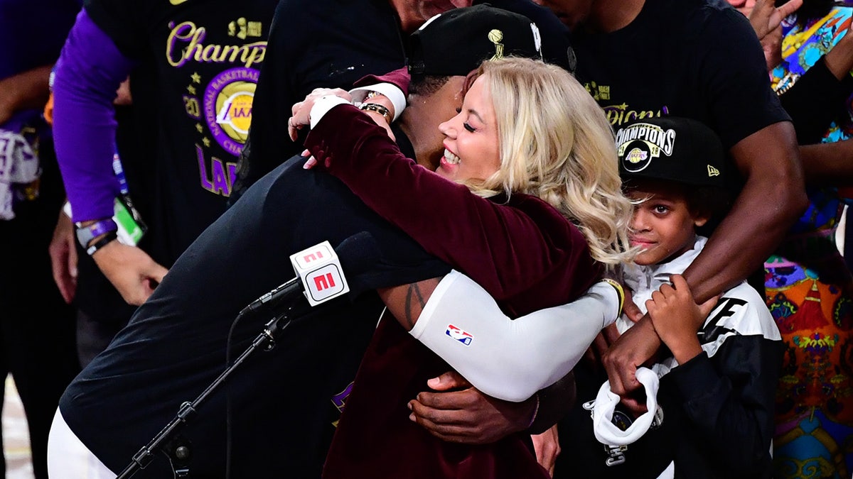 LeBron James celebrates with Jeanie Buss