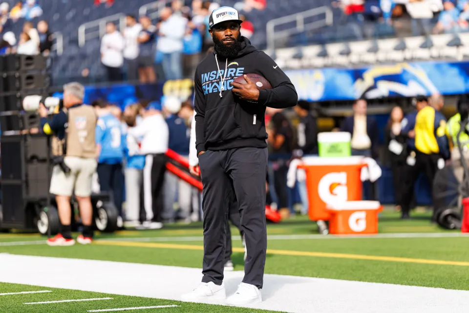 Linebackers coach Navarro Bowman of the Los Angeles Chargers stands on the field prior to an NFL football game against the Houston Texans at SoFi Stadium 