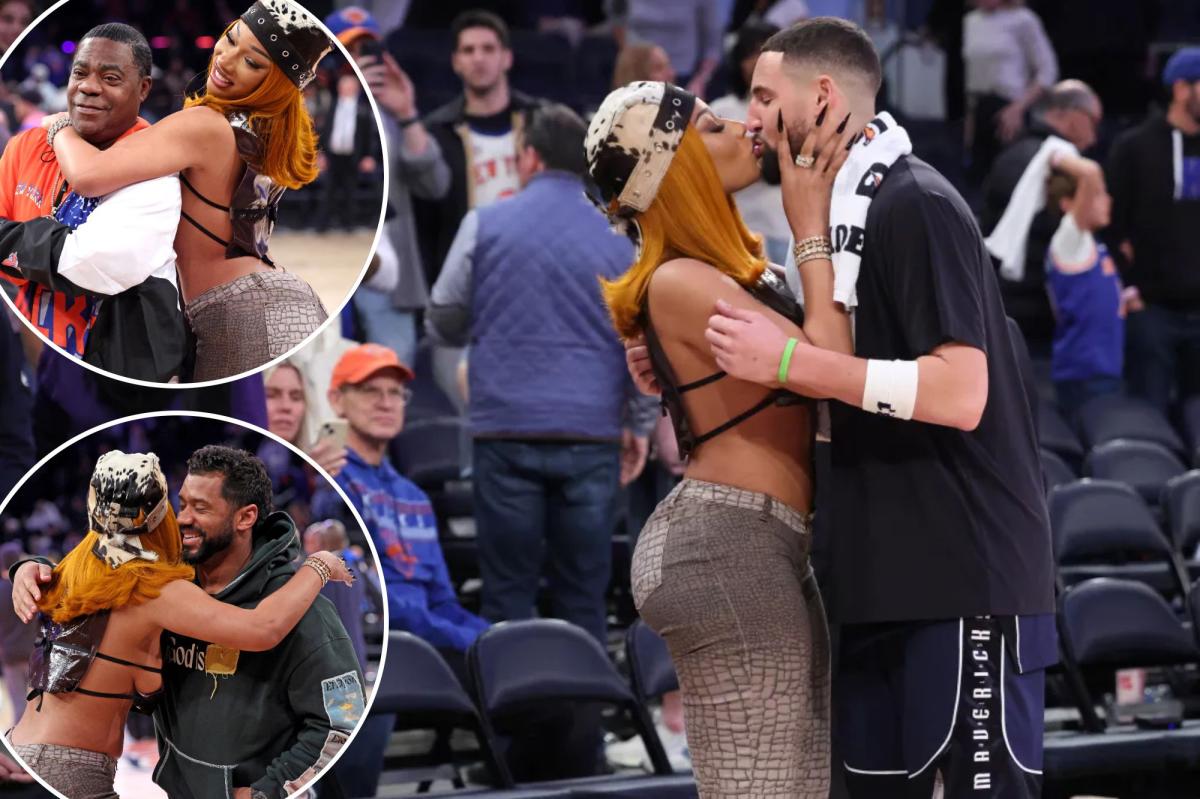 Megan Thee Stallion kisses Klay Thompson after Mavericks' win over Knicks