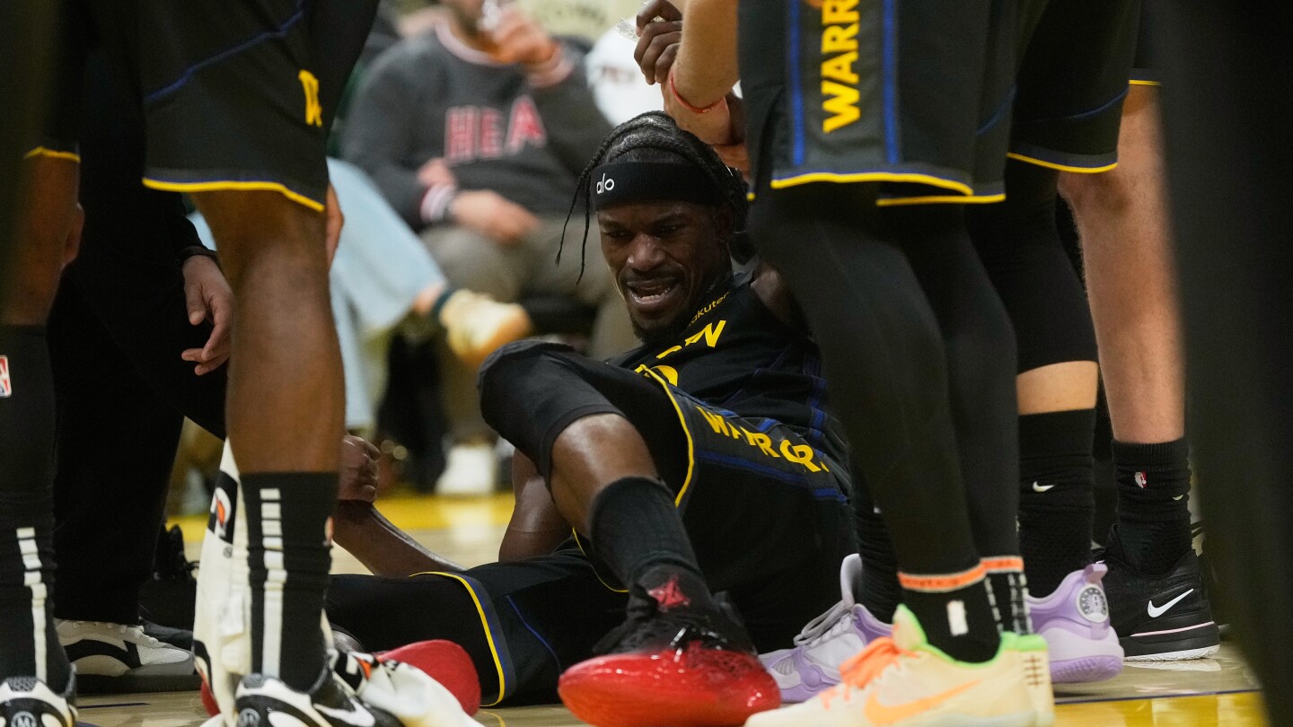 Warriors star Jimmy Butler injured against former Miami team