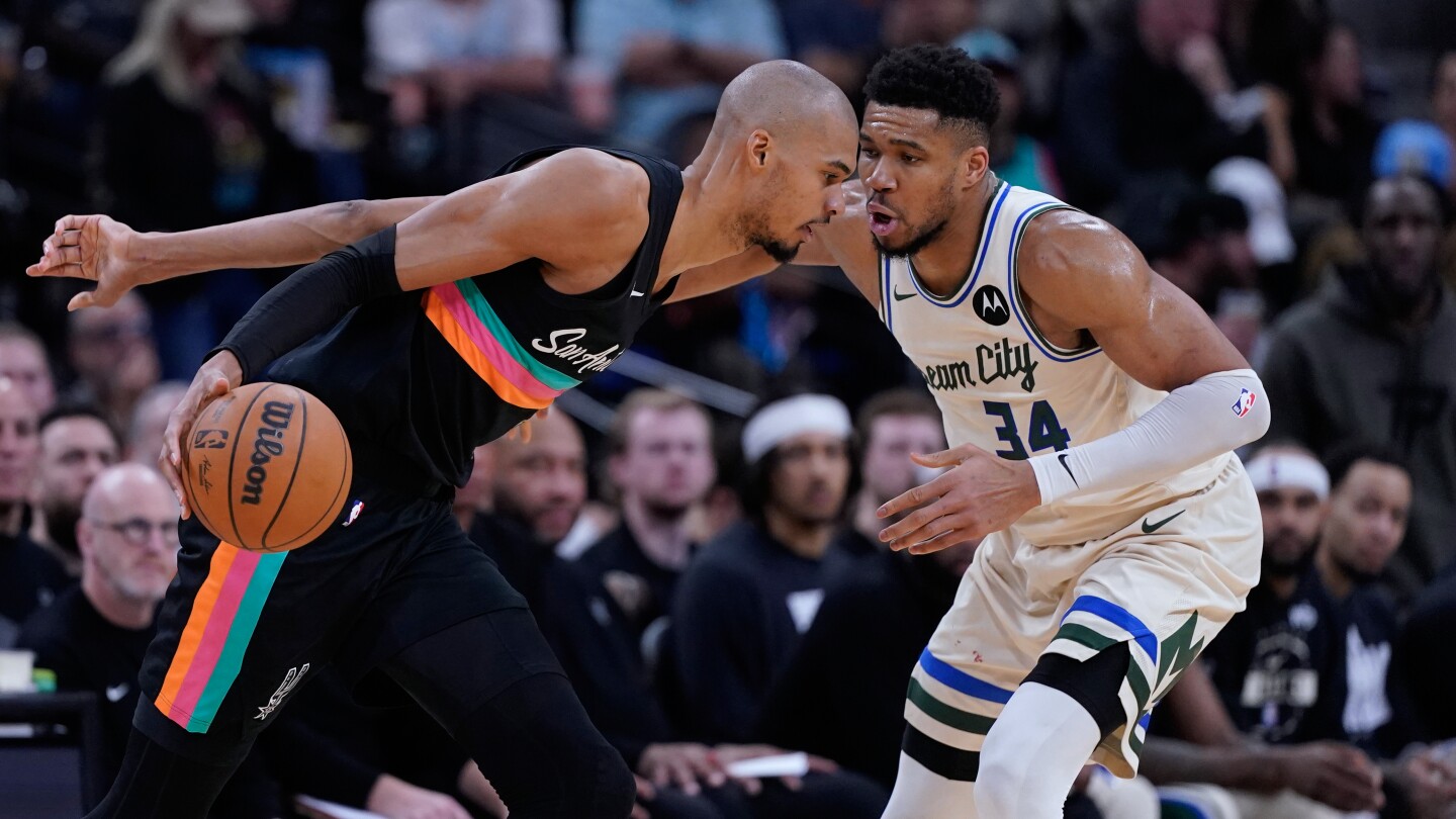 Wembanyama shaves head, shines brightly in leading Spurs past Antetokounmpo, Bucks