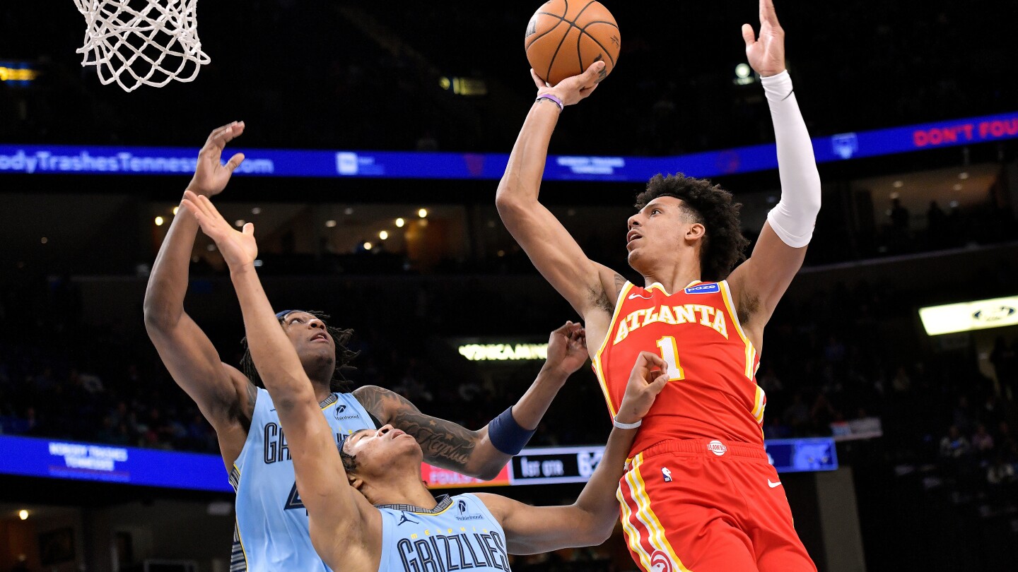 Jalen Johnson has 32 points, 15 rebounds to lead the Hawks to a 124-122 victory over the Grizzlies