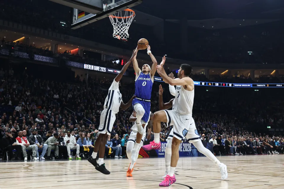 Anthony Black #0 of the Orlando Magic dunks the ball during the game against the Memphis Grizzlies as part of the 2026 NBA Berlin Game on January 15, 2026 at Uber Arena in Berlin, Germany.