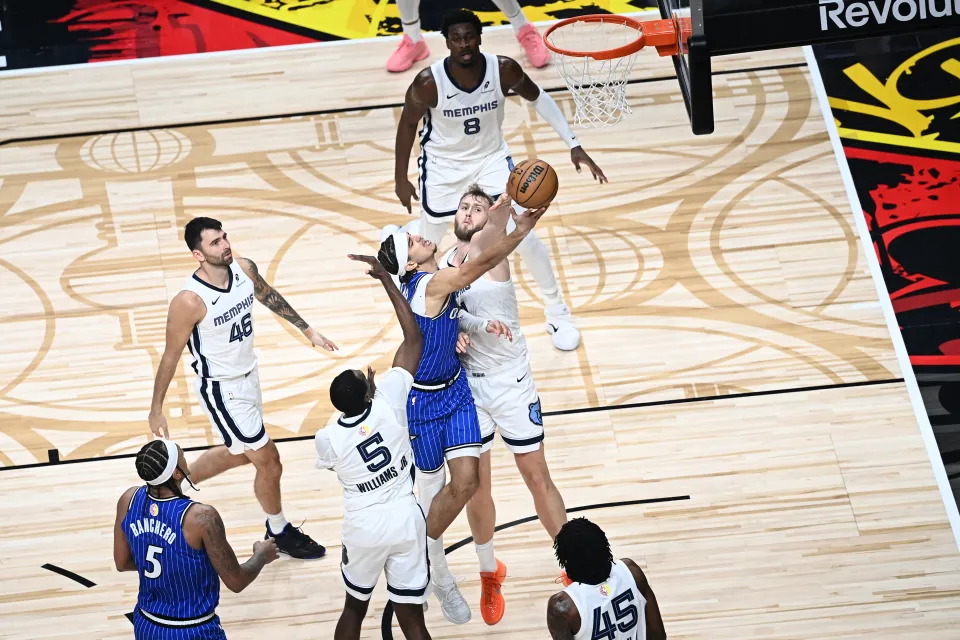  Anthony Black #0 of the Orlando Magic drives to the basket during the game against the Memphis Grizzlies as part of the 2026 NBA Berlin Game on January 15, 2026 at Uber Arena in Berlin, Germany.
