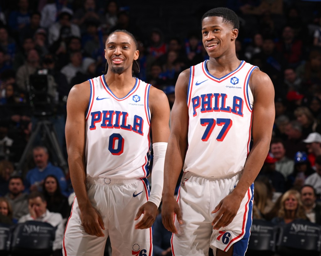 Tyrese Maxey #0 and VJ Edgecombe #77 of the Philadelphia 76ers smiles during the game against the Phoenix Suns on January 20, 2026.