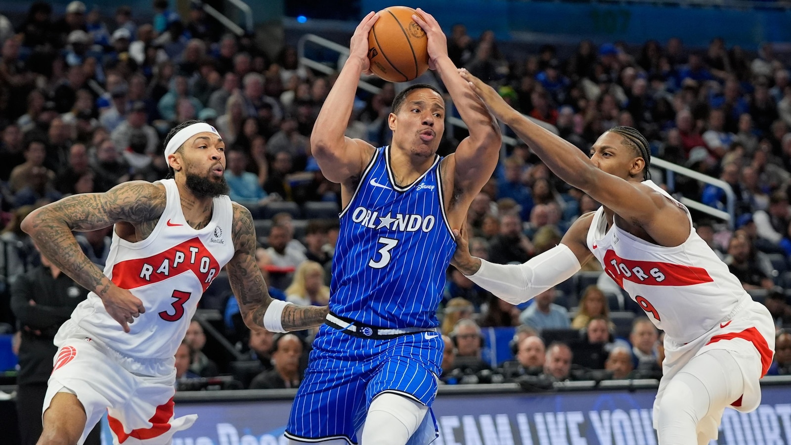 Bane leads Magic's rally in fourth quarter to beat Raptors 130-120