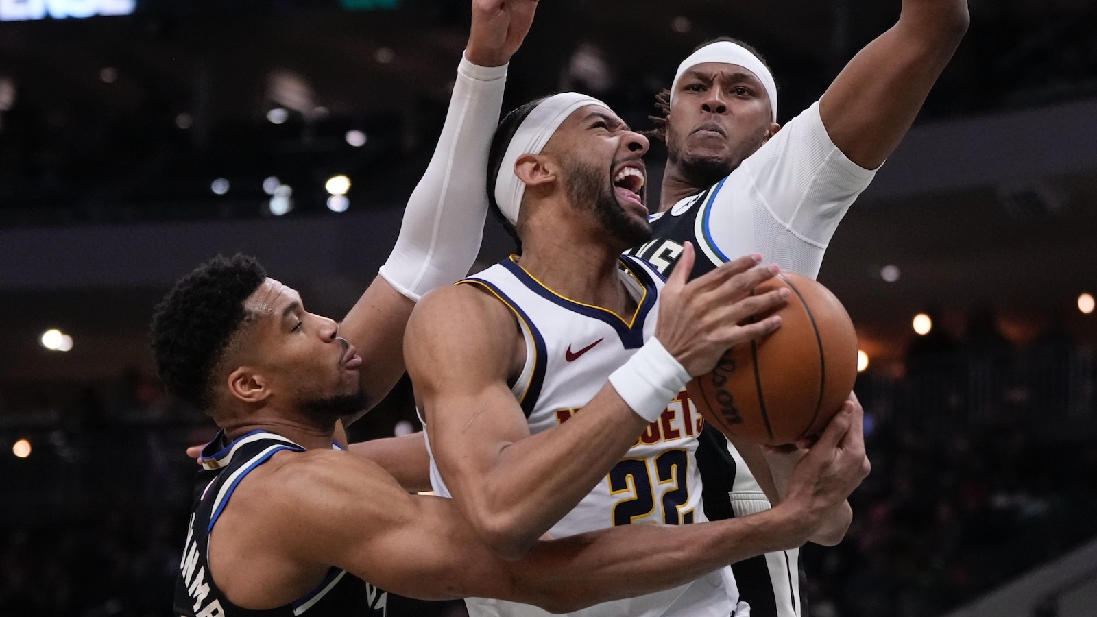Strawther scores 20 points as short-handed Nuggets outlast slumping Bucks 102-100