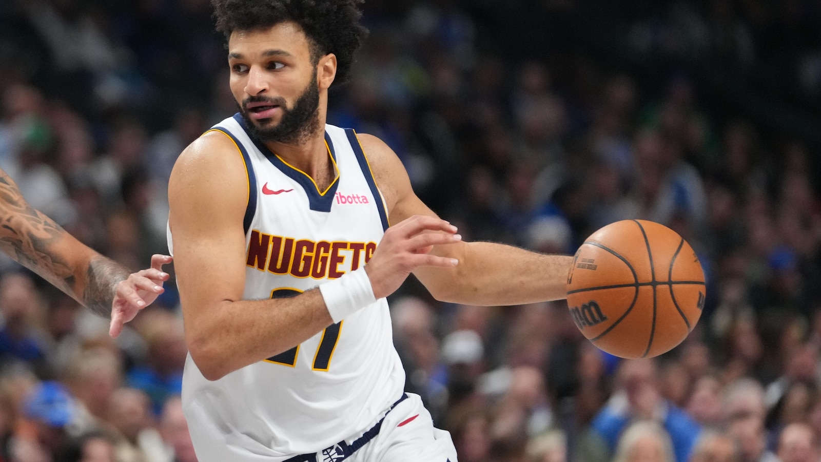 Jamal Murray scores 33 and Nuggets beat Mavs 118-109 as Cooper Flagg exits with sprained ankle