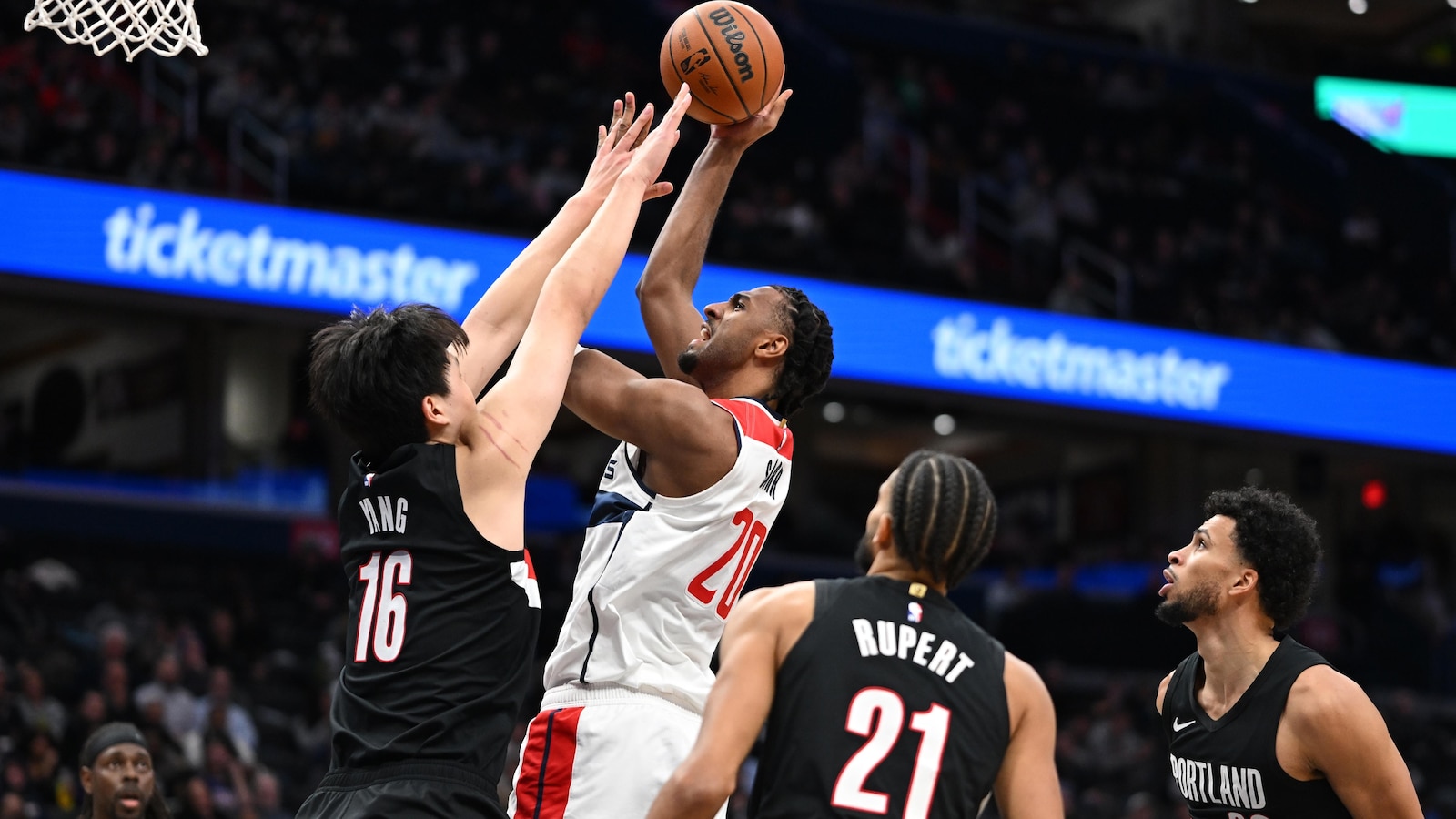 Sarr's big night helps the Wizards snap a 9-game skid with a 115-111 win over Portland