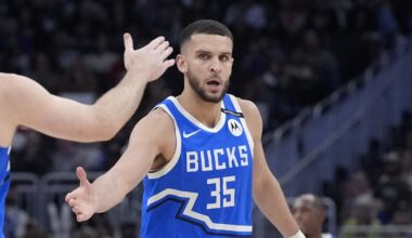 Milwaukee Bucks forward Pete Nance (35) celebrates with Milwaukee Bucks guard Pat Connaughton (24) after making a three point shot against the Detroit Pistons at Fiserv Forum on April 13, 2025.