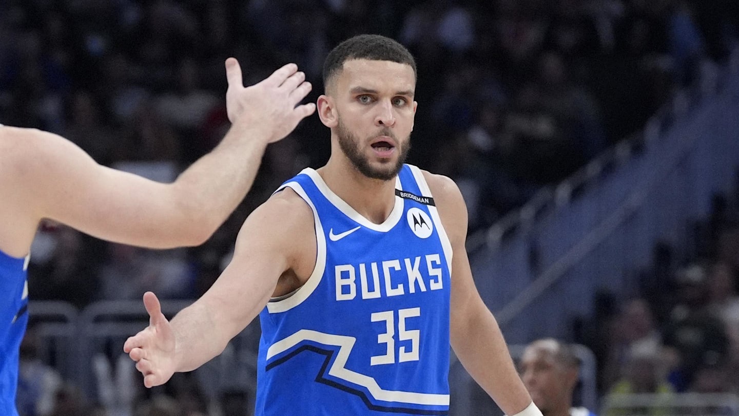 Milwaukee Bucks forward Pete Nance (35) celebrates with Milwaukee Bucks guard Pat Connaughton (24) after making a three point shot against the Detroit Pistons at Fiserv Forum on April 13, 2025.