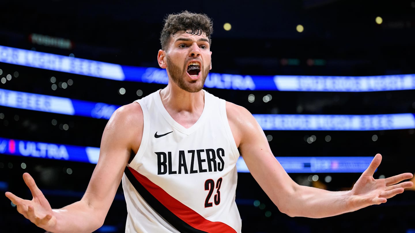 Oct 27, 2025; Los Angeles, California, USA; Portland Trail Blazers center Donovan Clingan (23) reacts during the first half against the Los Angeles Lakers at Crypto.com Arena. Mandatory Credit: William Liang-Imagn Images