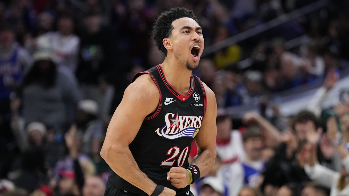 Nov 23, 2025; Philadelphia, Pennsylvania, USA; Philadelphia 76ers guard Jared McCain (20) reacts after scoring against the Miami Heat in the second quarter at Xfinity Mobile Arena. Mandatory Credit: Kyle Ross-Imagn Images