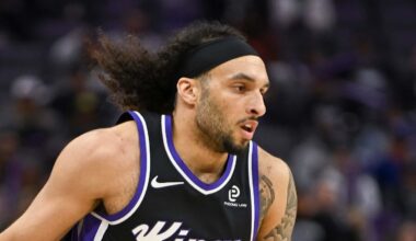 Feb 4, 2026; Sacramento, California, USA; Sacramento Kings guard Devin Carter (22) dribbles against the Memphis Grizzlies during the third quarter at Golden 1 Center. Mandatory Credit: Ed Szczepanski-Imagn Images