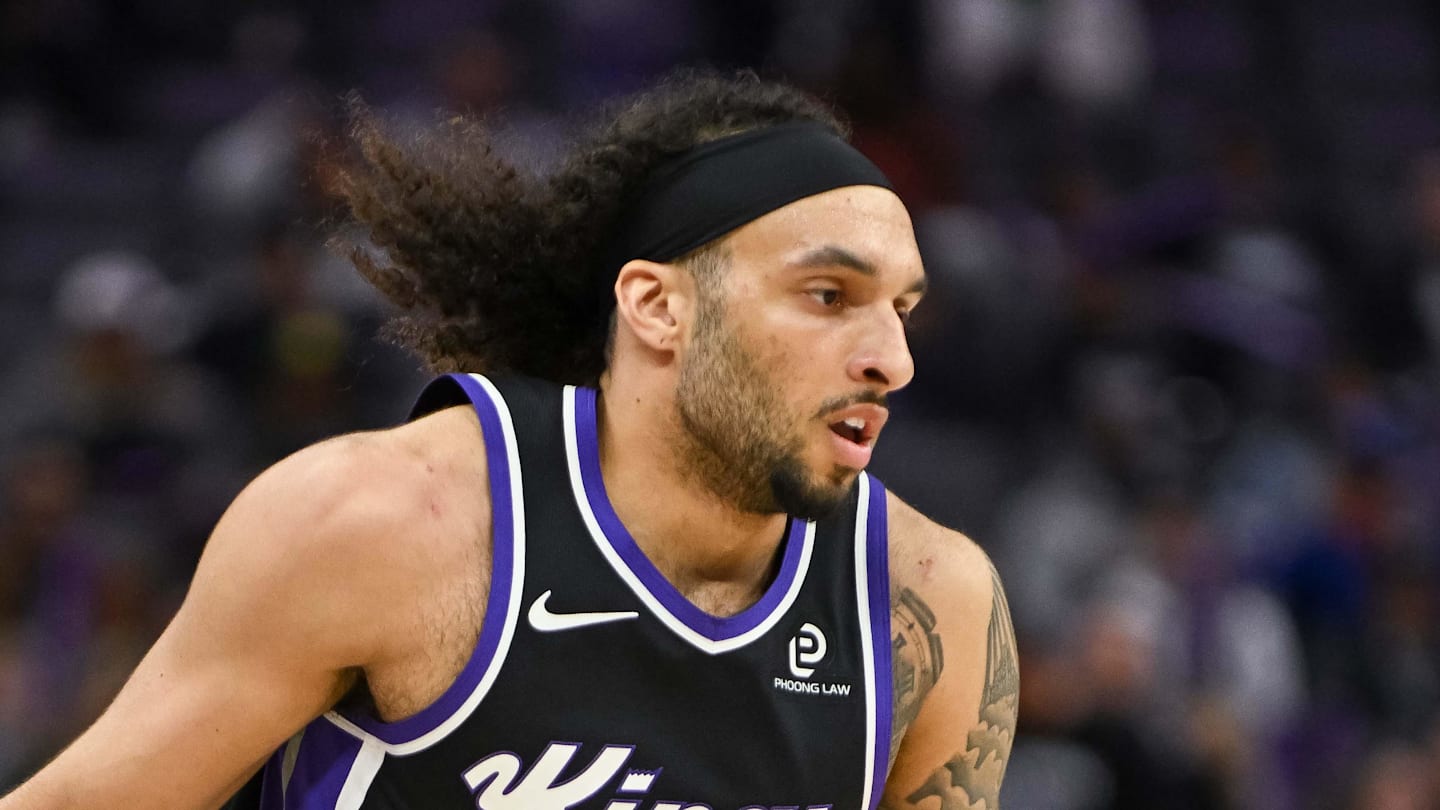 Feb 4, 2026; Sacramento, California, USA; Sacramento Kings guard Devin Carter (22) dribbles against the Memphis Grizzlies during the third quarter at Golden 1 Center. Mandatory Credit: Ed Szczepanski-Imagn Images